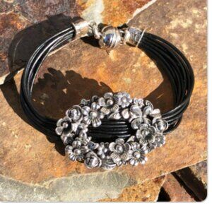 Sterling Silver Floral Buckle Bracelet on Black Leather Cording